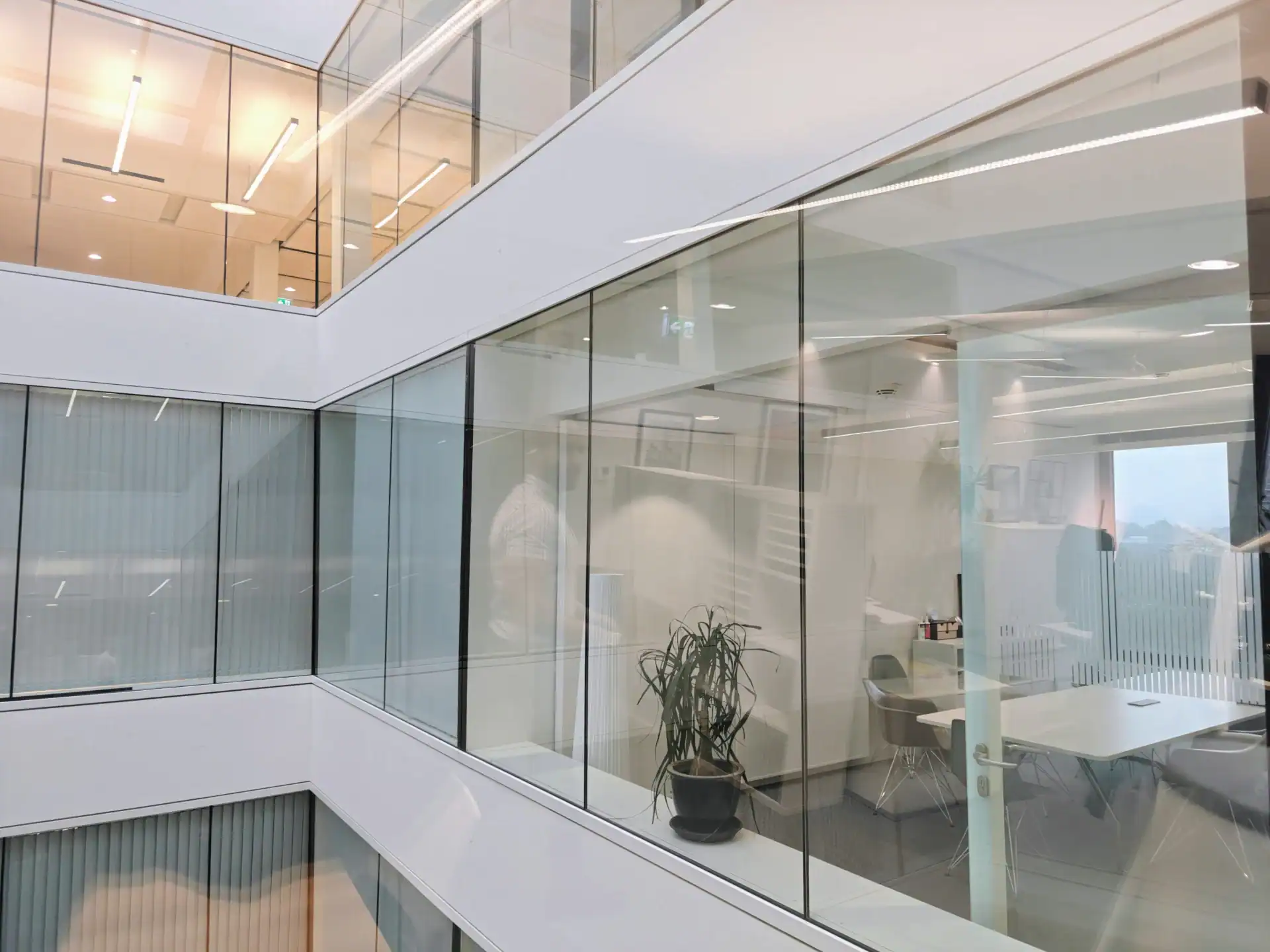 Glass fronts and offices in the building on Campus-Boulevard